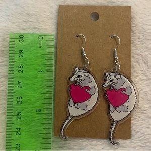 Possum with heart earrings